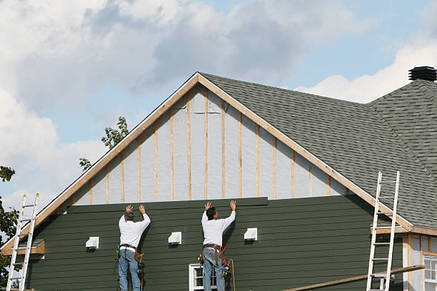 Professional Vinyl Siding technician working in Churchville, NY